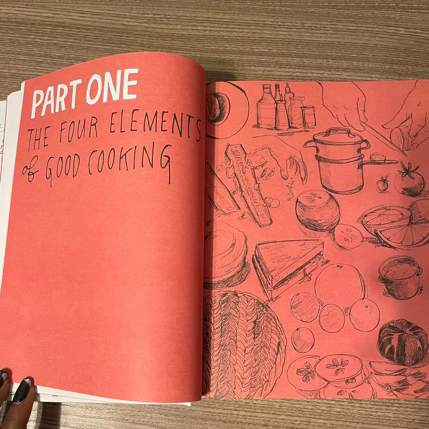Customer photo of Salt Fat Acid Heat cookbook open to a recipe page with seasoning notes