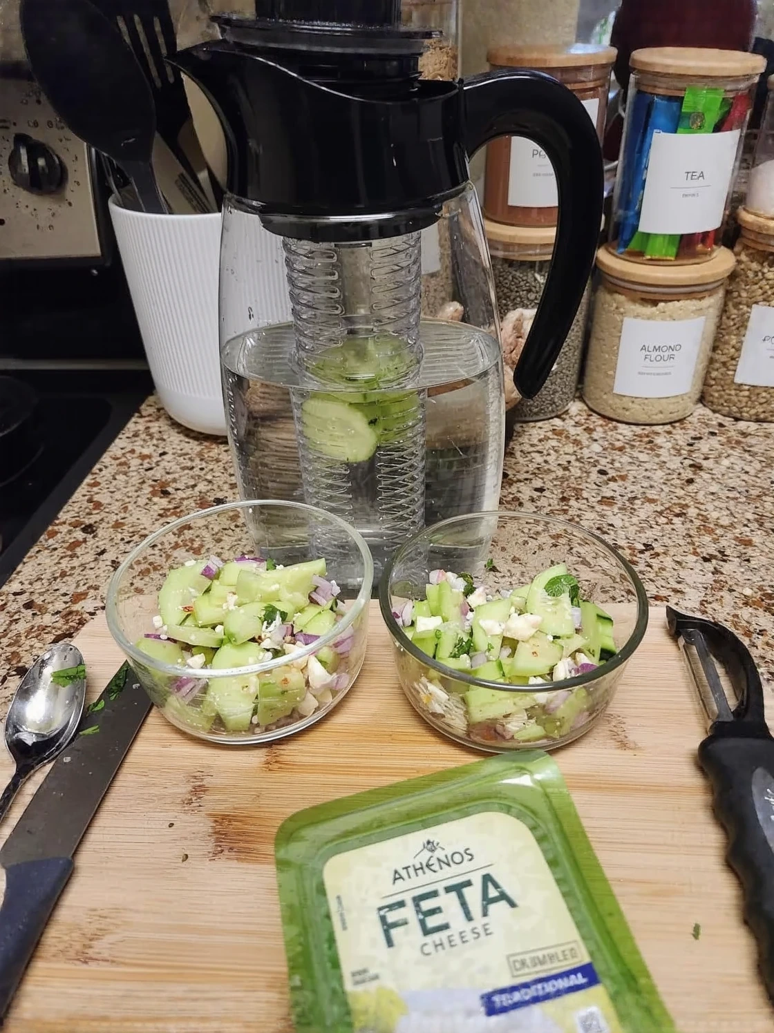 Customer photo of whipped feta dip in a bowl with pita chips and fresh vegetables