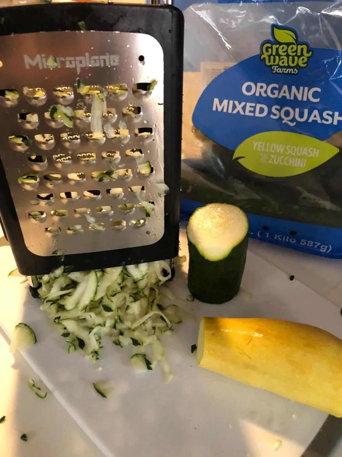 Customer photo of box grater with finely shredded cheese for queso dip