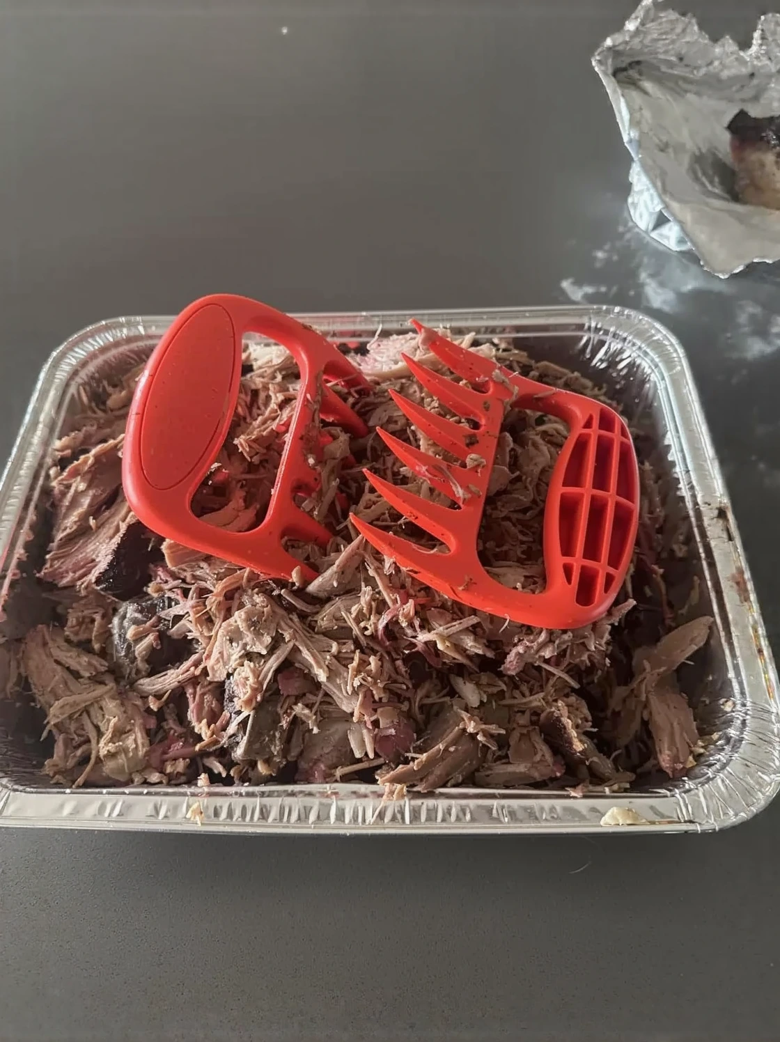 Customer photo of BBQ pulled pork dip served in a bowl with tortilla chips for dipping