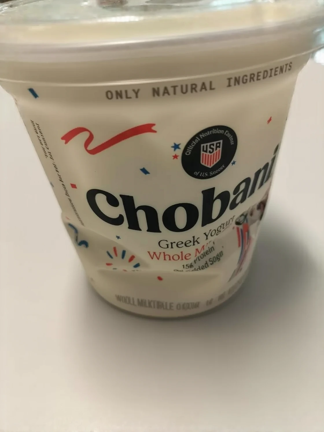 Customer photo of fresh herb yogurt dip in a white bowl with herbs sprinkled on top