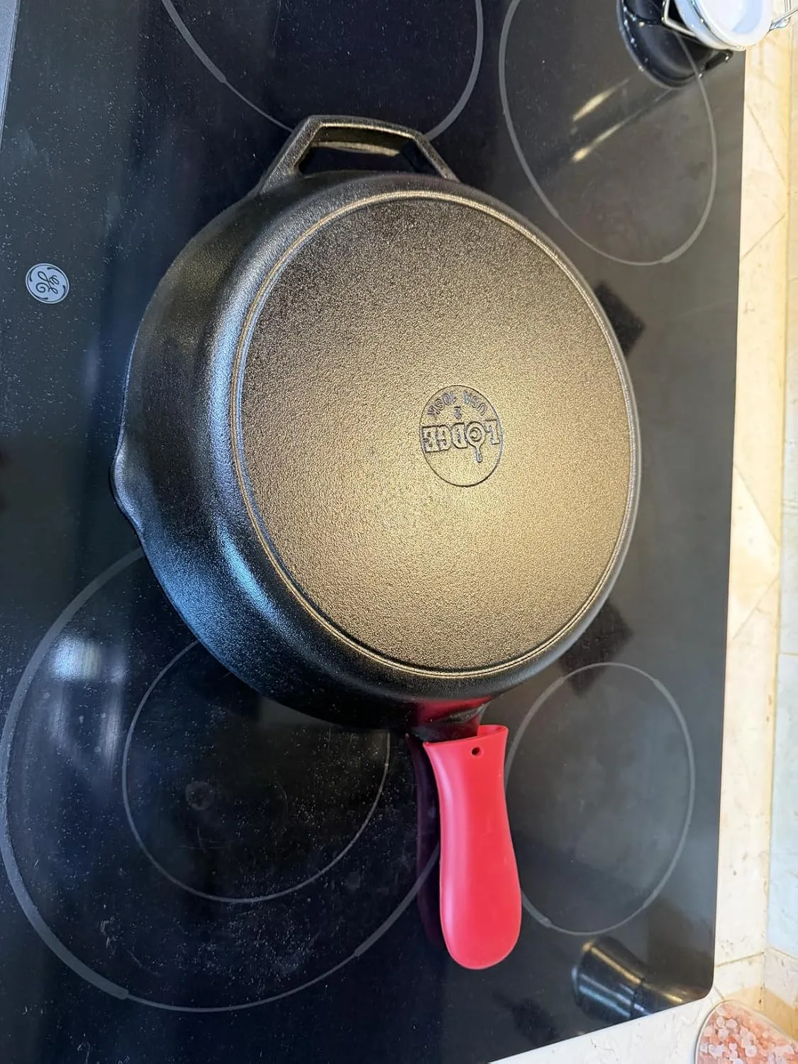 Customer photo of cast iron skillet filled with melted cheese and jalapeño dip