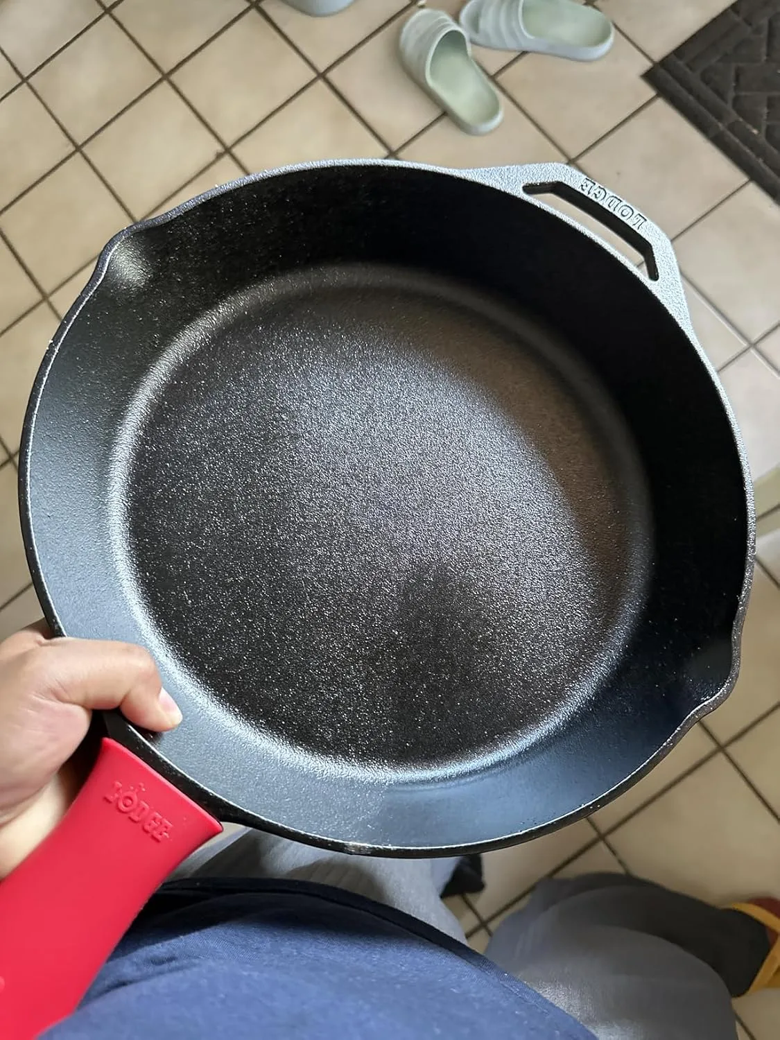 Customer photo of cast iron skillet filled with melted cheese and hot dip