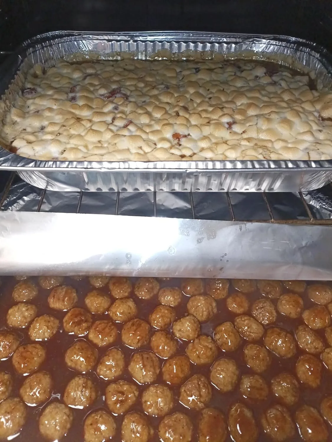 Customer photo of cheesy meatball dip in serving bowl with melted cheese and meatballs