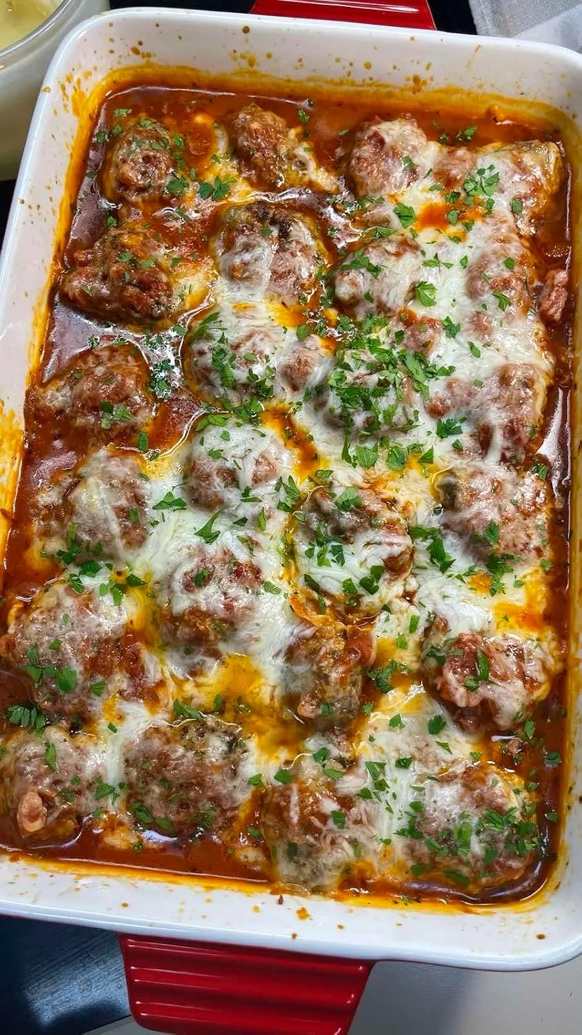 Customer photo of cheesy meatball dip in serving bowl with meatballs visible