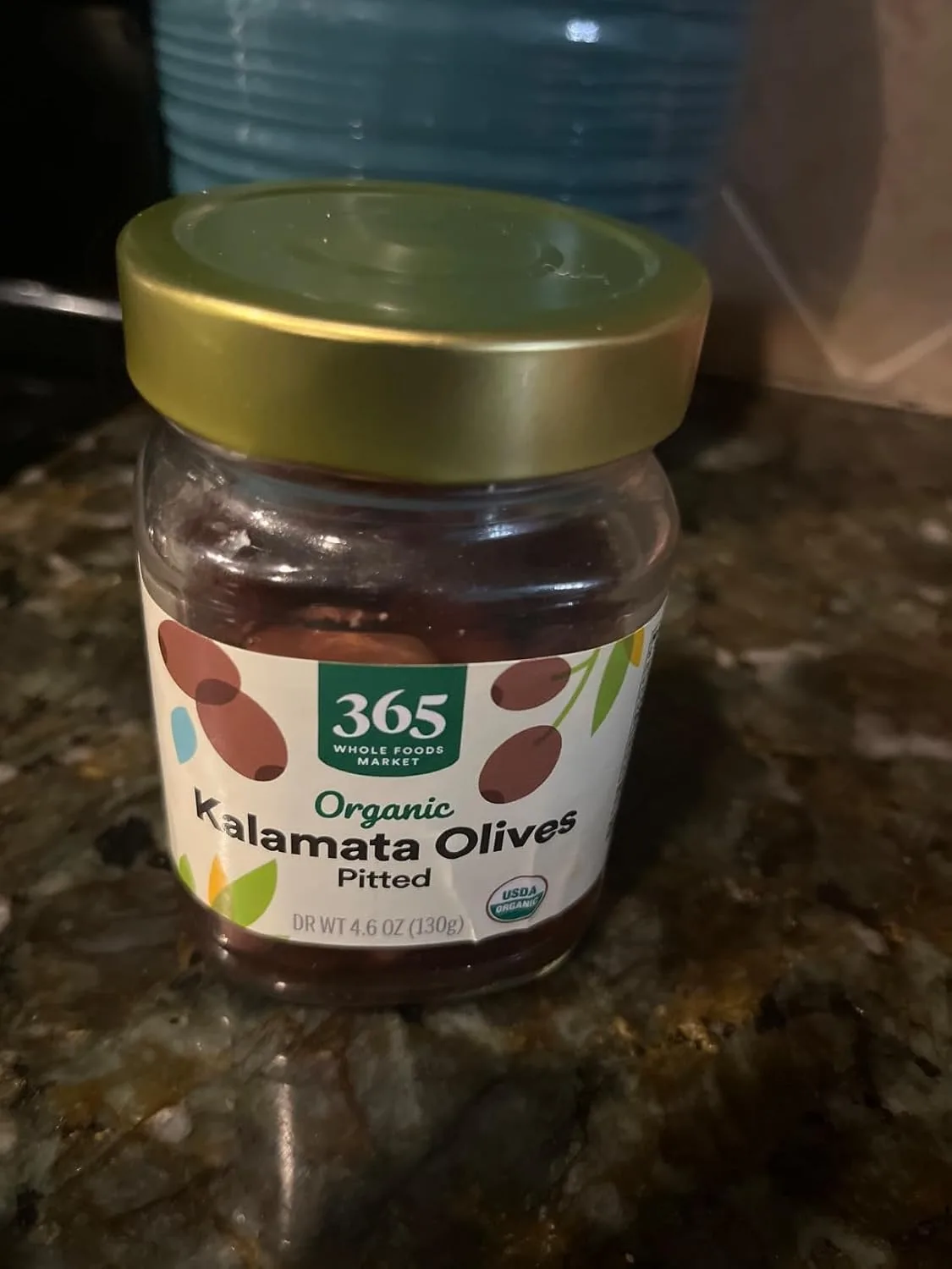 Customer photo of olive tapenade spread on fresh bread and crackers