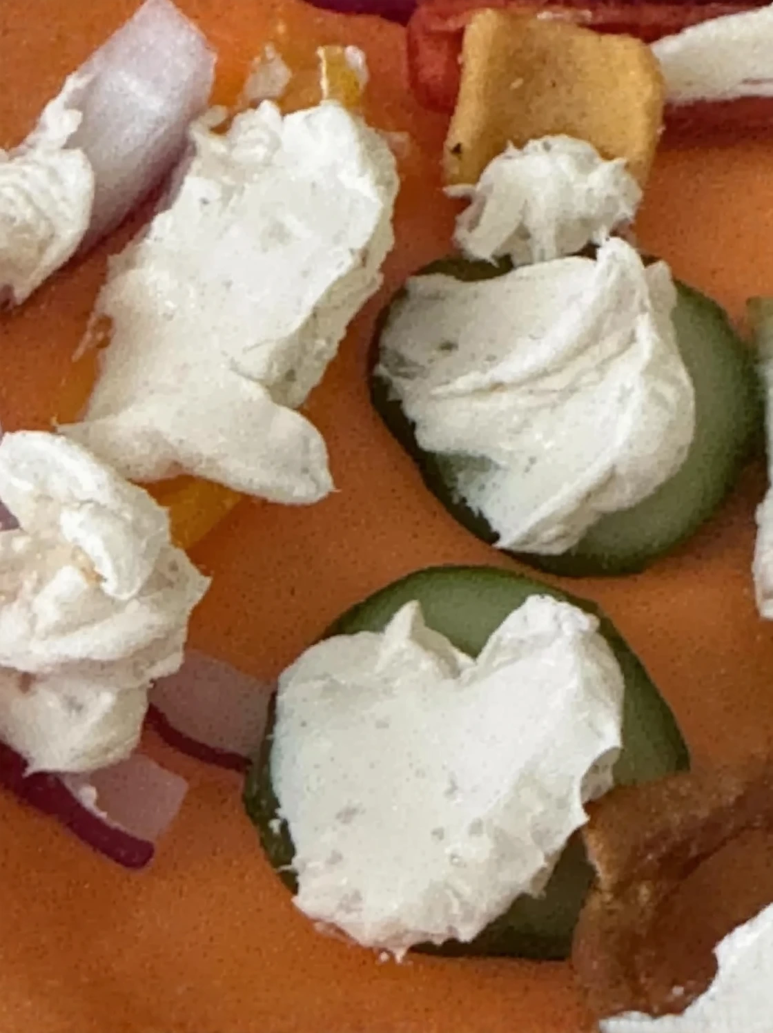 Customer photo of spinach artichoke dip in a serving bowl showing creamy texture without excess liquid