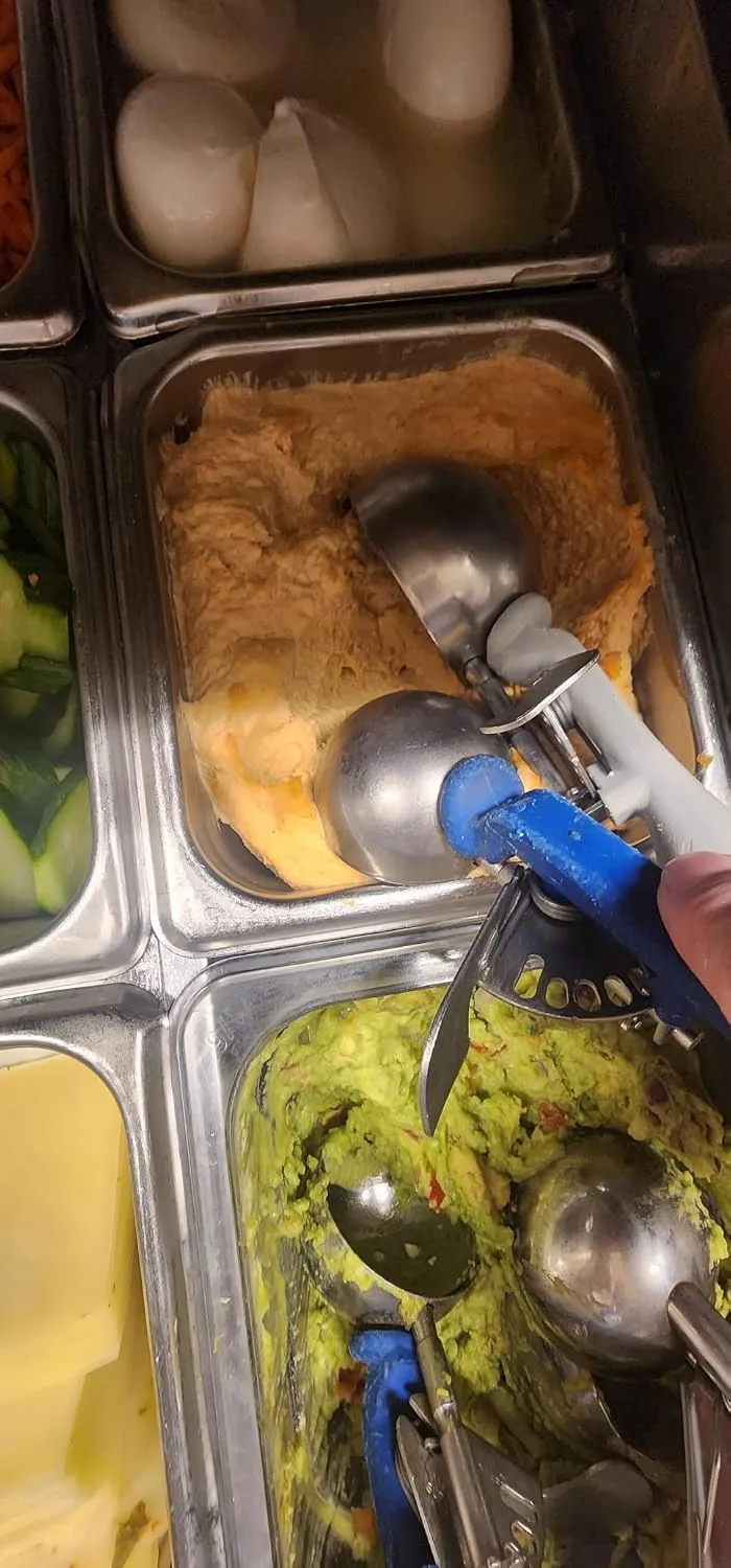 Customer photo of creamy hummus being processed in KitchenAid food processor bowl