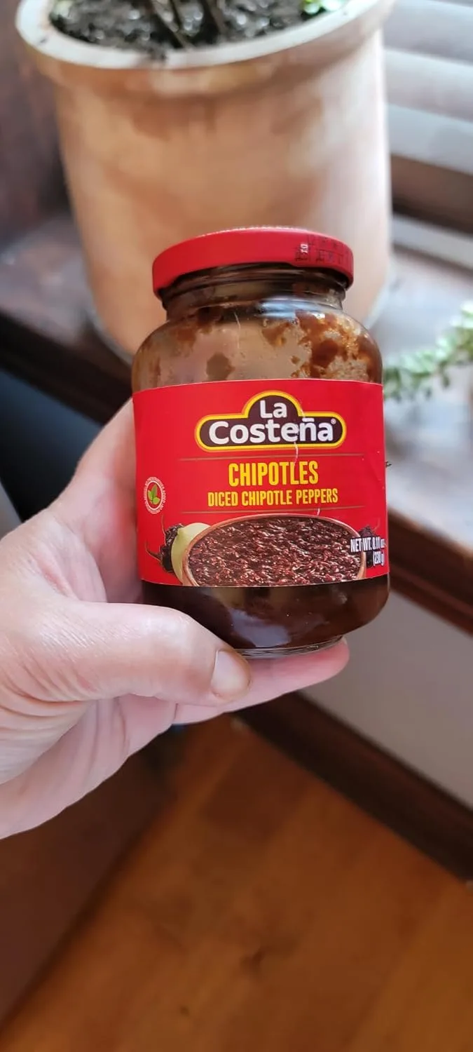 Customer photo of jar queso cheese dip with serving suggestions and toppings