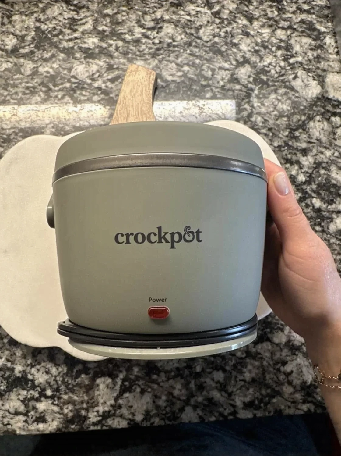 Customer photo of creamy white queso dip in a crockpot with melted cheese