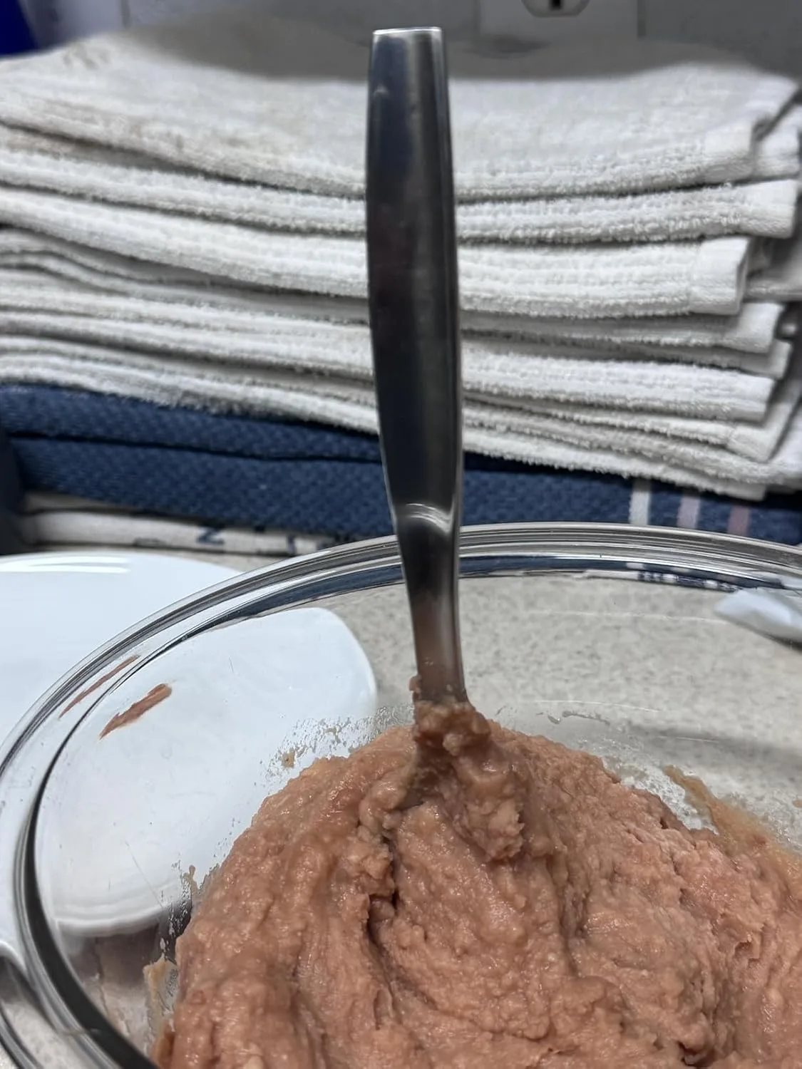 Customer photo of classic bean dip served in a baking dish with tortilla chips for scooping