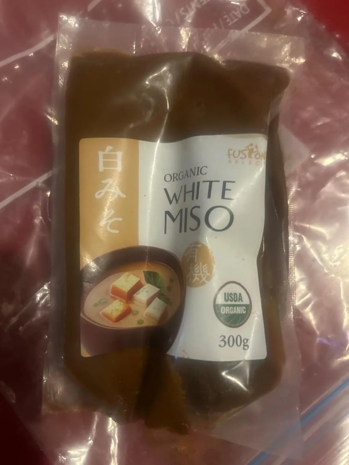 Customer photo of miso caramelized onion dip in bowl with chips for serving