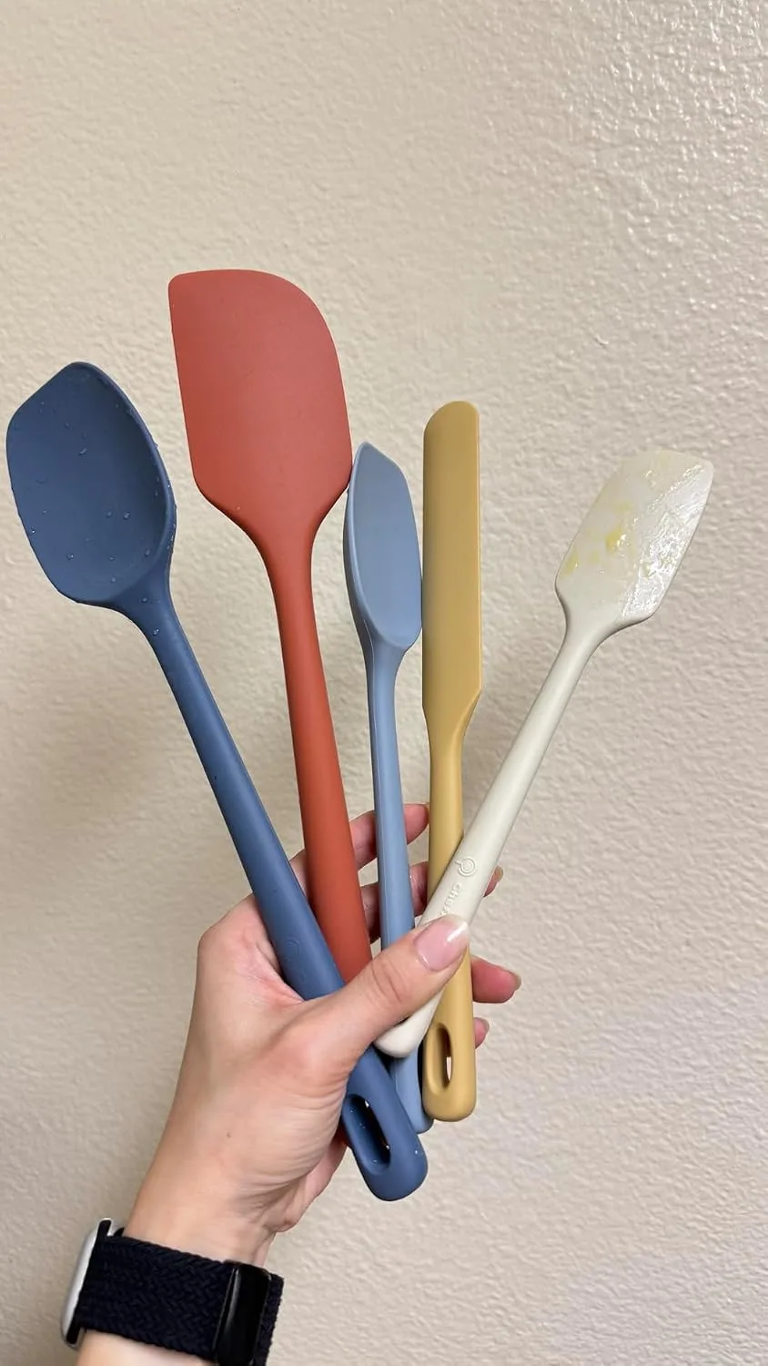 Customer photo of silicone spatula being used to scoop creamy dip from a bowl