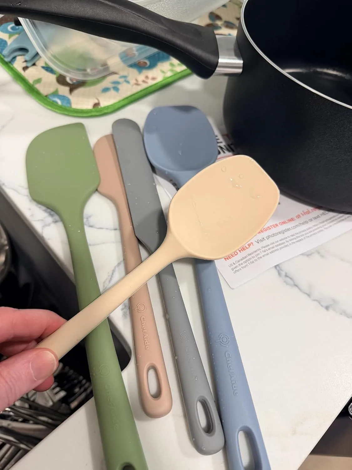 Customer photo of silicone spatulas in use while mixing creamy dip in a bowl