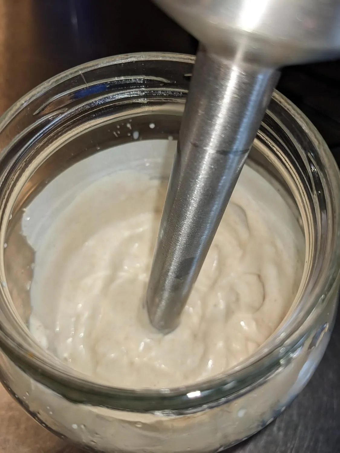 Customer photo of immersion blender blending creamy hummus in a bowl